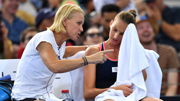 'It's not over ... you know this': Rennae Stubbs gives a motivational and tactical talk to Karolina Pliskova during the Brisbane final.