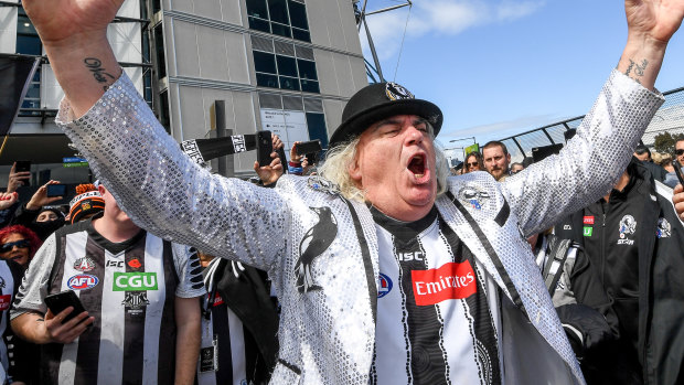 Jeffrey ‘Joffa’ Corfe leads the Magpie Army in song outside the MCG before the 2018 grand final loss against West Coast. 