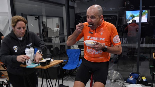 Breakfast on the bike at 6am on Thursday: Rupert Guinness during the Virtual Race Across America.