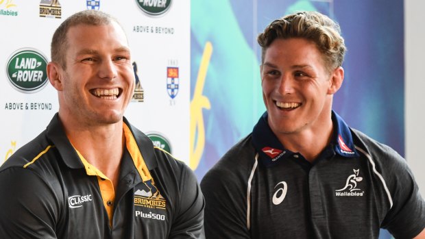 Battle: David Pocock and Michael Hooper at a Rugby Australia function this year. 