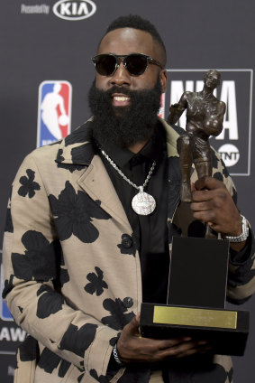 James Harden shows off his trophy.