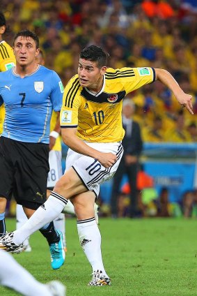 James Rodriguez scores against Uruguay four years ago.