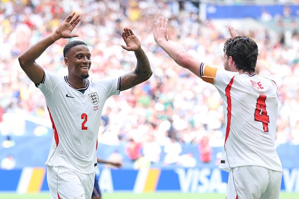 Ezri Konsa and Declan Rice celebrate after the second goal. 
