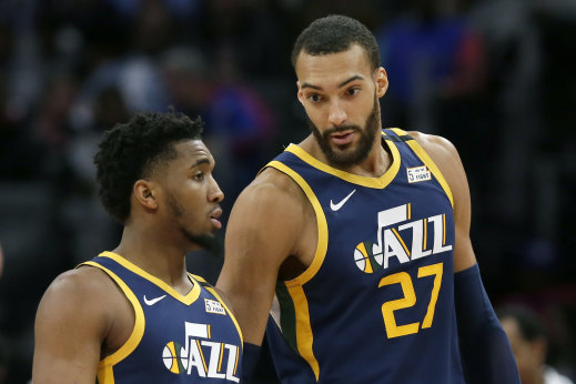 Utah Jazz teammates Donovan Mitchell (left) and Rudy Gobert have been afflicted by the coronavirus.