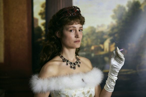 Vicky Krieps gives a stunning performance as Sisi, the rebellious wife of Emperor Franz Joseph of Austria, in Corsage.
