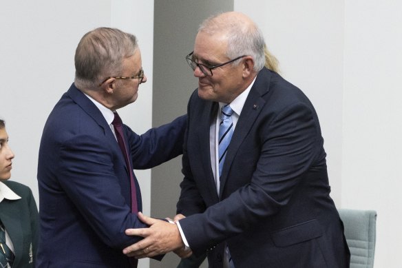 Scott Morrison and Anthony Albanese exchange a handshake (and a cowpat sandwich). 