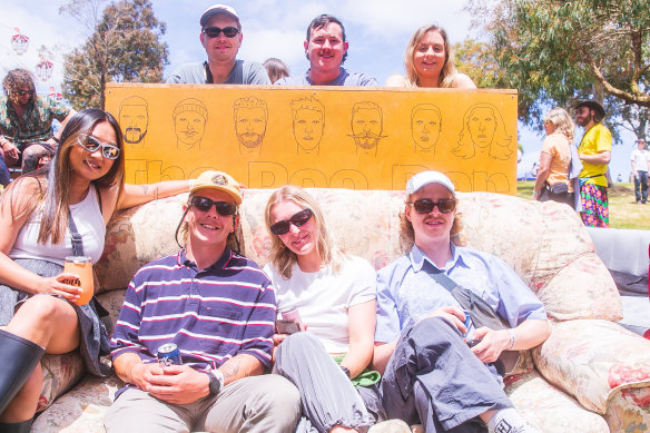 Billy Goodwin (second from the left) and friends make full use of their bar-and-couch set-up at Meredith Music Festival 2022. 