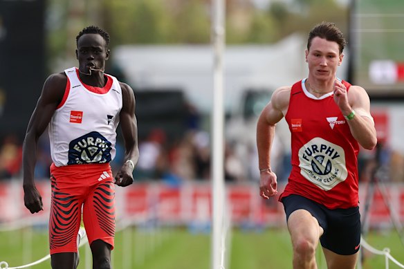 Gout Gout and Lachlan Kennedy in the back markers’ race after missing the Stawell Gift final.