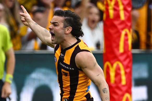 Nick Watson of the Hawks celebrates a goal.