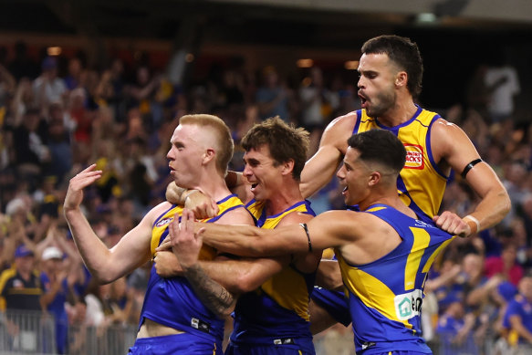 West Coast celebrate their second win of the season.