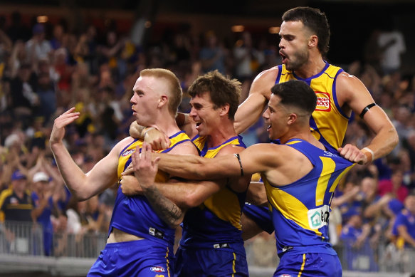 West Coast celebrate their second win of the season.