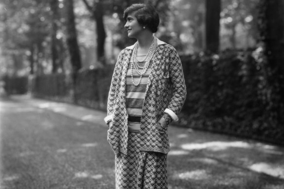 The pockets of designer Coco Chanel – pictured here wearing one of her suits in 1929 – suited the posture of the decade.