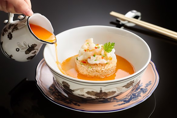 A dish of Boston lobster and poached rice at the Ritz-Carlton Singapore’s Summer Pavilion Cantonese restaurant.