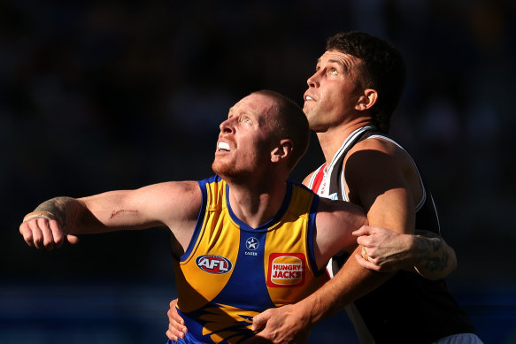 Bailey J. Williams of the Eagles contests a ruck with Rowan Marshall of the Saints.