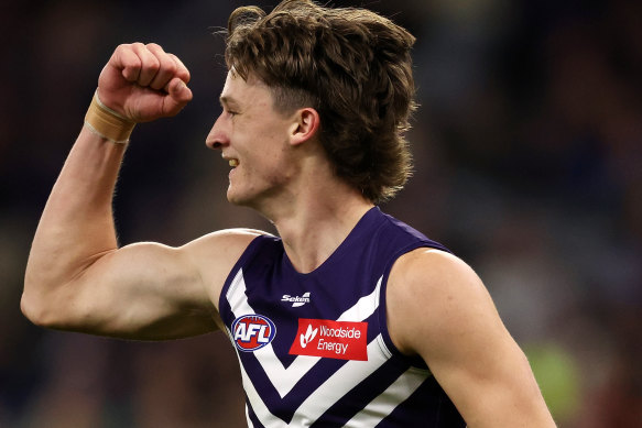 Jye Amiss of the Dockers celebrates after scoring a goal during the 2023 AFL Round 15 match between the Fremantle Dockers and the Essendon Bombers at Optus Stadium on June 24, 2023 in Perth, Australia.