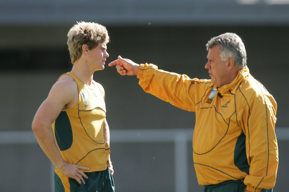 Former Wallabies coach John Connolly with Berrick Barnes during a training session.