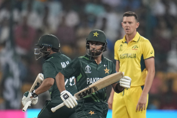 Josh Hazlewood looks on as Pakistan’s Imam-ul-Haq and Abdullah Shafique make a bright start.