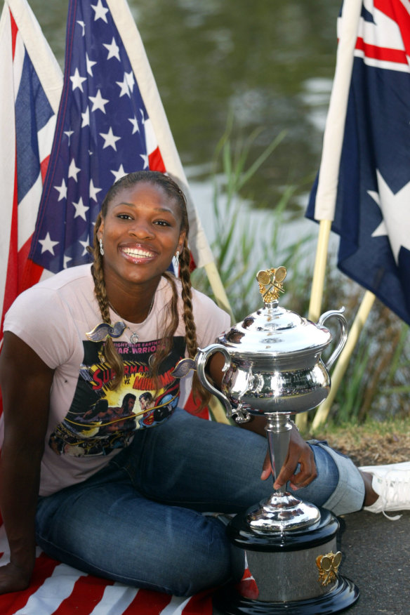 Serena Williams with her Australian Open trophy alongside the Yarra River in Melbourne on January 25, 2003.