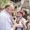 ‘We live in a prison camp’: Craig Kelly greeted with cheers at Sydney protest
