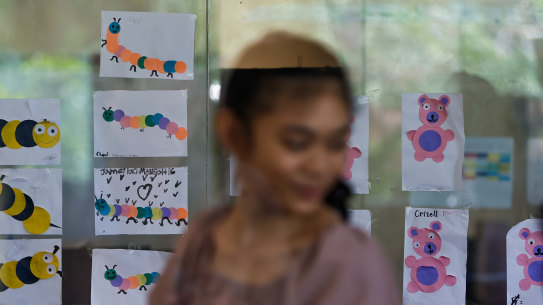 Girls are seen inside a playroom at the PREDA children protection centre, in Olongapo, Zambales, The Philippines.  
 