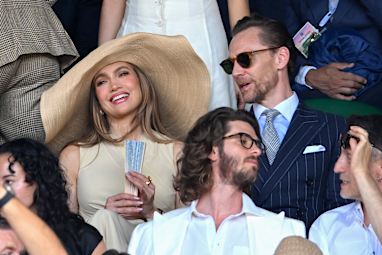 Jennifer Lopez and Tom Hiddleston at the 2026 Wimbledon Tennis Championships at the All England Lawn Tennis and Croquet Club on July 12, 2026 in London, England.