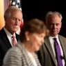 Democratic senators Jeanne Shaheen and Tim Kaine (right), and independent Angus King explain their decision to back the compromise plan at a late-night news conference in Washington.