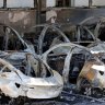 Destroyed Teslas after a fire at a company’s dealership in Rome, Italy, on Monday.