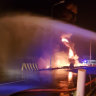 Firefighters try to extinguish a blaze at an Aramco terminal in the southern border town of Jizan, Saudi Arabia. 