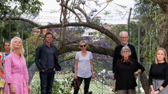 Woollahra councillor Harriet Price (second from left) and local residents outside the White City tennis centre.