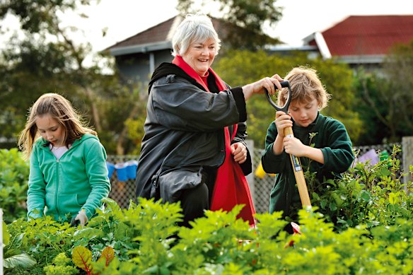 Cultivating joy: Stephanie Alexander and students in a primary school kitchen garden.