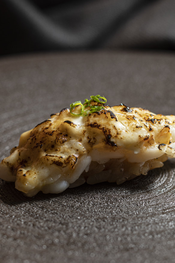 Lightly torched scampi nigiri.