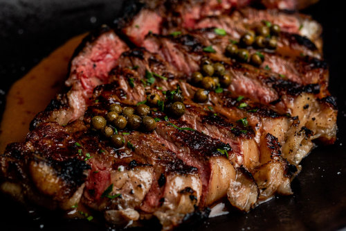 Dry-aged Dandaragan beef sirloin with green pepper and brandy sauce.