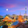 View of Tokyo skyline with Senso-ji Temple and Tokyo skytree at twilight.
