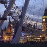 The London Eye with Houses of Parliament in the background.