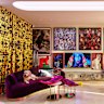Lurid fluorocolours are highlighted in a resin chandelier and a three-seater lounge daubed The Throne, that was originally created for a Hermes exhibition.