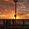 Dawn in Manly saw hundreds of residents on the promenade exercising and walking dogs. Coronavirus
Photo Nick Moir 27 March 2020