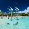 CAIRNS, AUSTRALIA - 27 MARCH 2016. Tropical swimming lagoon on the Esplanade in Cairns with artificial beach, Queensland, Australia. L&amp;L FRESH DIRECTIONS FIONA CARRUTHERS Cairns