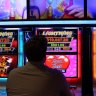 Council says ‘no choice’ but to keep approving pokies in city, urges change