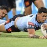 NRL player Latrell Mitchell reported online abuse he has received.