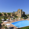 The resort, with its pool and tower.