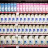Coles and Woolies up milk prices as cost-of-living crunch hits dairy sector