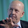 Goldman Sachs CEO faces pay hit after company pays $US3b to settle probe into 1MDB scandal