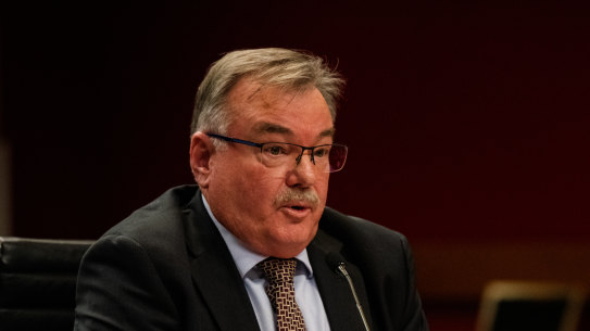 icare CEO John Nagle under fire at a parliamentary hearing.