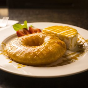 Pineapple fritter with ice-cream.