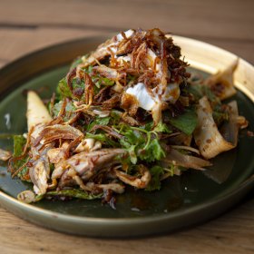 Salad of quail, roasted chilli, banana blossoms and sesame seeds. 