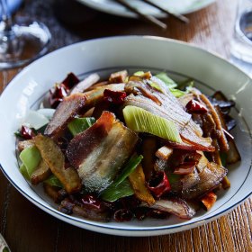 Pork stir-fried with smoked tofu and chilli.