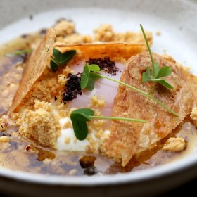 Cilbir (egg with smoked yoghurt).