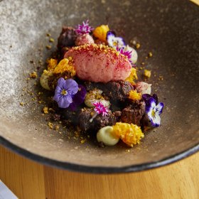 Dark choc brownie with pistachio and blood orange.