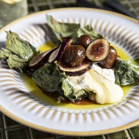 Baked Stella Alpina cheese with figs.