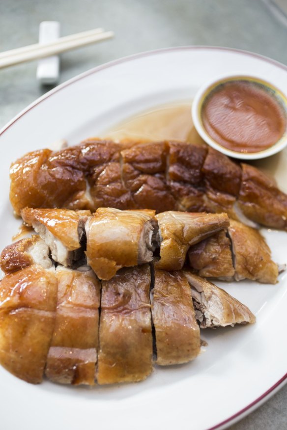 Half-roast duck with plum sauce.
